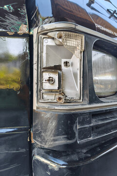 Broken vintage car headlight