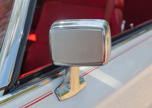 Vintage and antique car side mirror.
