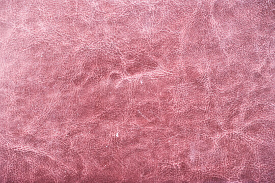 Close-up of red leather show detail and texture suitable for use as background
