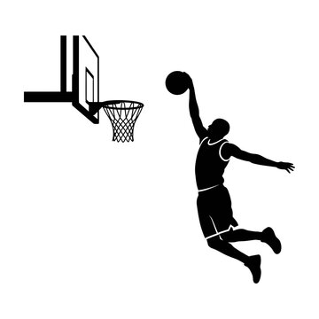 Basketball Player Silhouette Executing A Dynamical Layup Near The Hoop