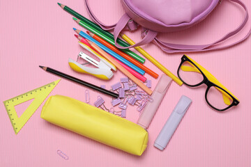 School stationery and accessories for elementary school on a pink background. Back to school concept. © splitov27
