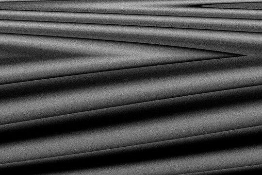 Abstract Monochrome Textured Background with Parallel Grooves and Shadows.