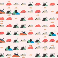 Stylized mountain and desert landscape seamless pattern © nurlelania