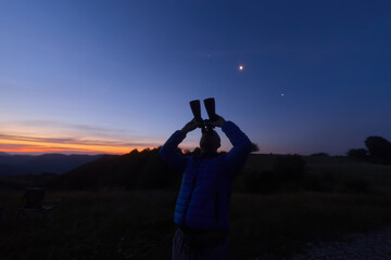 Amateur astronomer observing stars, planets and other celestial objects. © astrosystem