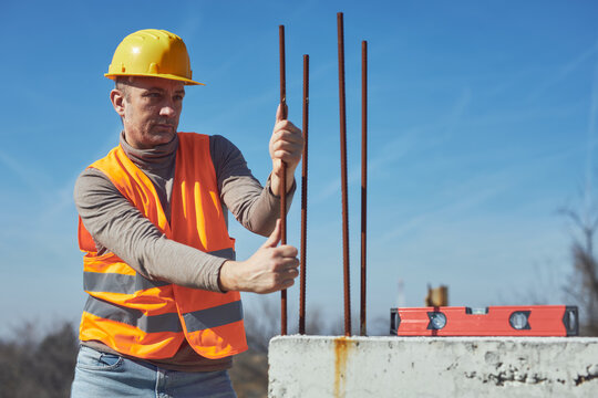 Construction worker working outdoors on a construction site.