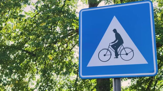 Traffic sign that allows bicycle traffic in a green park area