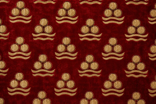 Cintemani pattern, Ottoman discs and tiger stripes, velvet background