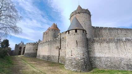 Carcassonne medieval fortress walls with blue sky © Arianne