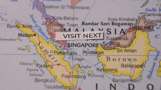 Visit Next text on map of Malaysia and Southeast Asia travel destination