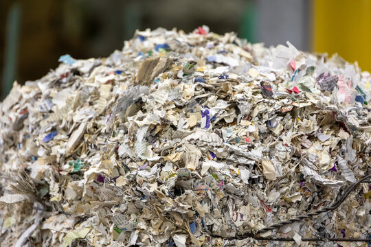 Large bale of shredded paper documents for recycling
