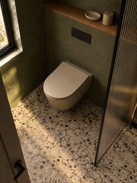 Warm sand ceramic wall hung toilet with a slim black flush plate in an olive wall