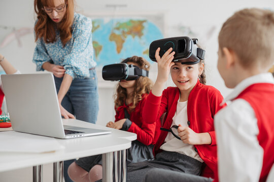 Primary school students exploring virtual reality during technology class.