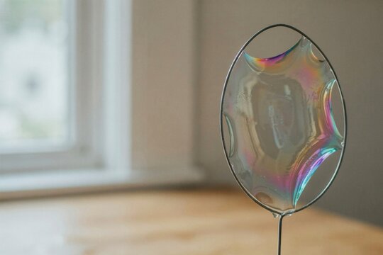 Soap film iridescence stretched across a wire loop