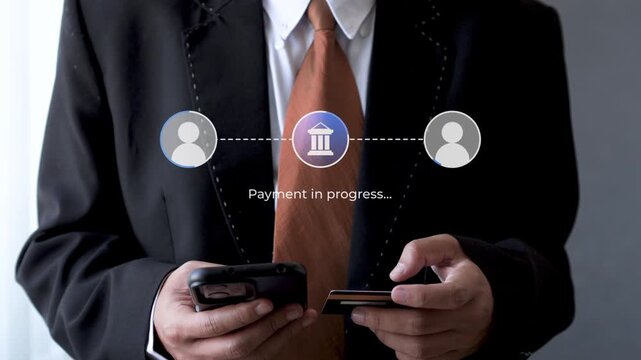 Businessman use smart phone and credit card for Direct peer-to-peer bank payment transfer processing