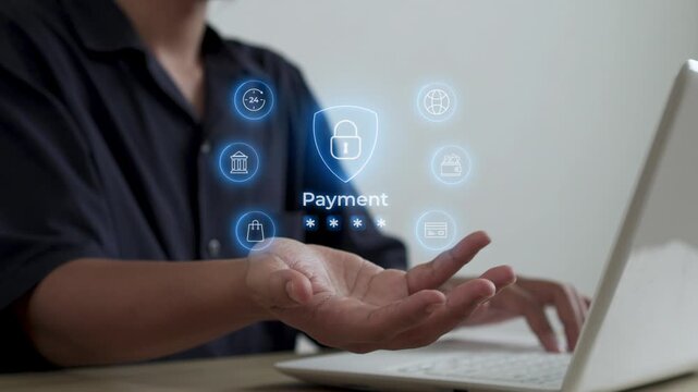 Casual Man typing on laptop with futuristic secure online payment portal floating over hand