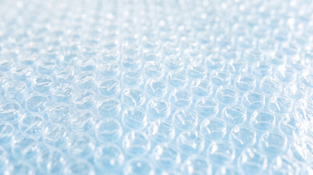 bubble wrap plastic packaging material roll cushioning protection shipping parcel fragile delivery package textured surface logistics insulation packing synthetic polyethylene layer pattern