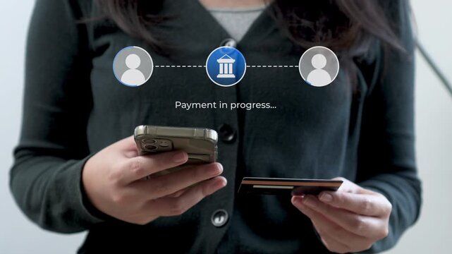 Woman using smart phone and credit card for Direct peer-to-peer bank payment transfer processing