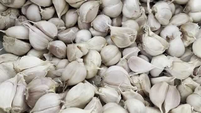 Fresh Solo Garlic Cloves Stacked Background Texture
