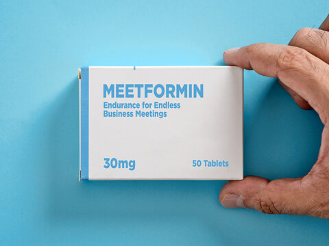 Hand holding fictional meetformin box for endless business meetings