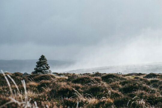 Snow squall crossing open moorland