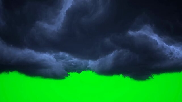 Green Screen Halloween Thunderclouds &mdash; Churning Storm Clouds with Inner Flashes for Keyable Sky VFX