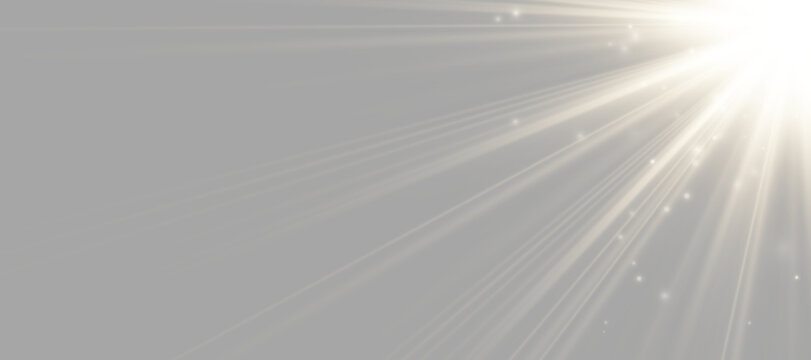 A beam of light radiates from the upper right corner in warm hues. The rays are long, soft, and spread diagonally across a dark background. The image features sparkling particles that.