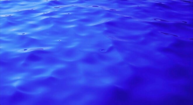 Vibrant Blue Water Surface Texture With Gentle Ripples.