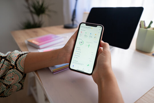 White person viewing digital health app on smartphone