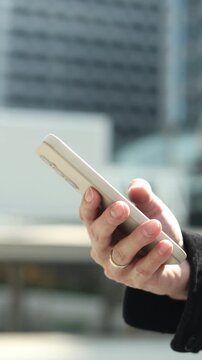 slow motion scene mamager businessman hand use smartphone to check work or reply email to customer for technology and business concept