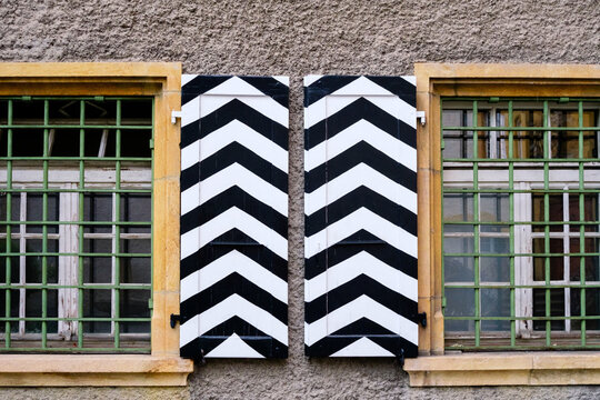 Decorative wooden doors with chevron patterns in Germany
