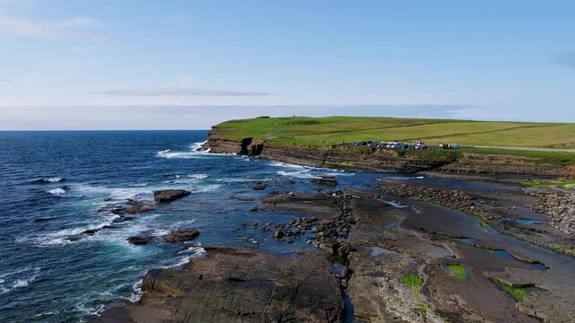 Aerial view of the rugged rocky coastline and cliffs near the Dun Briste sea stack in Ballycastle, County Mayo, Ireland.
