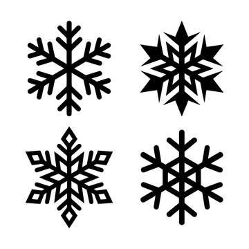 Set of four simple black snowflake icons for winter design Vector
