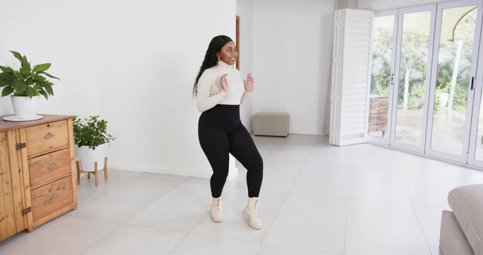 High speed photography for dynamic scenes, at home, woman pushing in living room