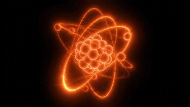 glowing orange atom model showing nucleus and electron orbits