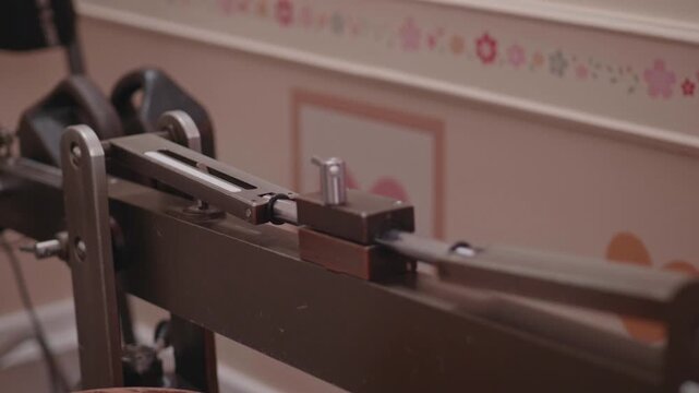 Close-Up of Mini Jib Arm Crane Mechanism Raising and Lowering on Film Set