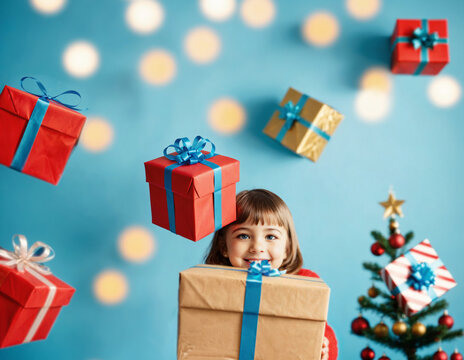 girl holding a wrapped present peeking over the top with colorful boxes flying around her near a christmas tree with bokeh lights.
