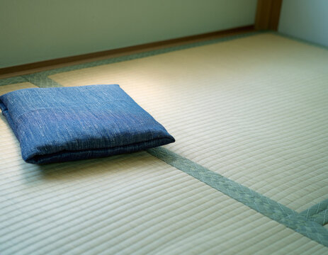 Folded Indigo Cushion on Tatami Floor Corner