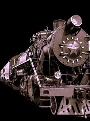 Vintage steam locomotive train isolated on black background, retro transport close up. © Павел Дзюба