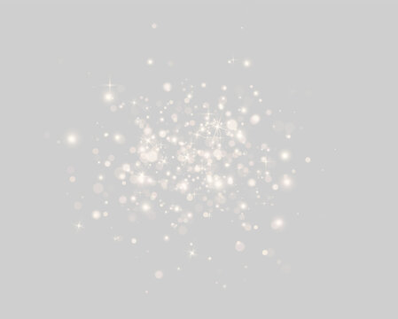 A cluster of soft golden bokeh lights sparkles delicately against a dark background. The scattered light spots vary in size and intensity with a subtle glow.