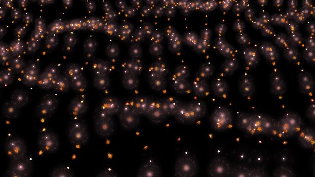 Golden particles float across a deep black expanse. Soft glow pulses gently in the dark