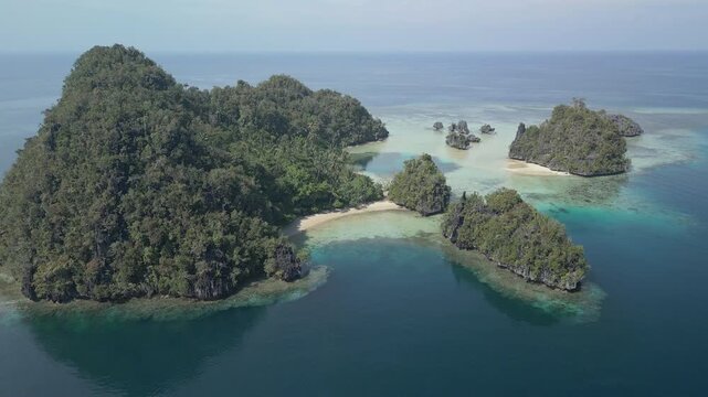 Aerial shot of the tropical islands near the Misool Archipelago, Raja Ampat, Indonesia