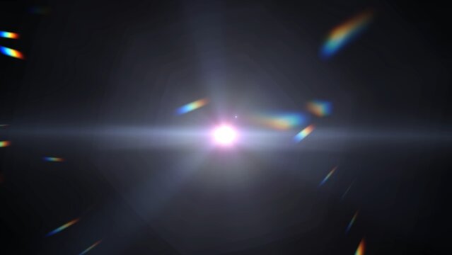 A bright radiant burst of light with colorful lens flares and radiating rays against a dark background
