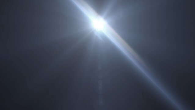 Bright light beams burst from a radiant center. Dynamic lens flare