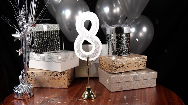 Silver Number 8 with Silver Glitter Confetti Sparkles with Gifts and Balloons and Cupcakes for Party Eight
