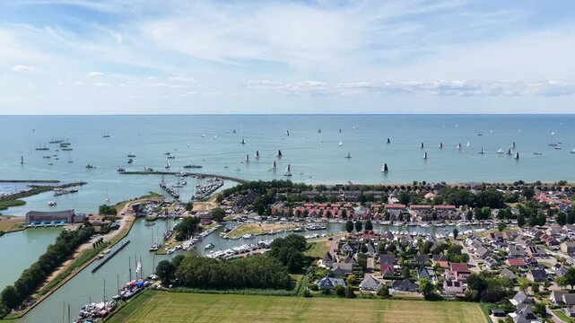 Aerial view of Stavoren with skutsjes sailing on the IJsselmeer