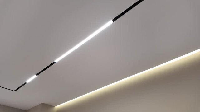 Modern lighting on ceiling in luxury home. Modern architectural lighting design