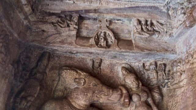 Ancient stone carvings inside the Badami Cave Temples in Karnataka, India, showcasing intricate craftsmanship and historic Indian rock-cut architecture