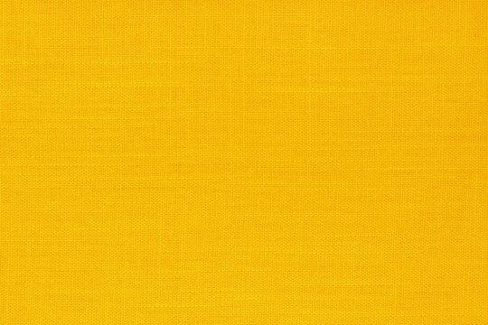 Yellow linen fabric cloth texture background, seamless pattern of natural textile.
