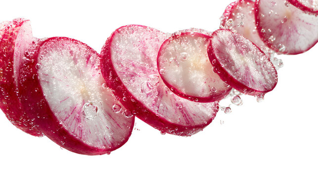 Sliced radish with water droplets on white background