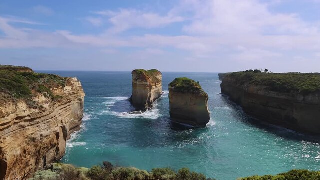 Panoramic view of Tom and Eva limestone rock stacks off Loch Ard Gorge on the Great Ocean Road coast Victoria Australia, Twelve Apostles National Park